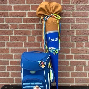 SAC D'ÉCOLE voiture assortie au cartable Lässig