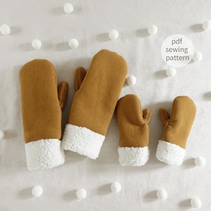May include: Three pairs of brown fleece mittens with white fleece lining. The mittens are arranged in a row from largest to smallest. The text "pdf sewing pattern" is in a white circle in the upper right corner of the image.