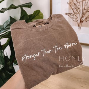 Embroidered Stronger Than The Storm Tee | Embroidery tshirt | Christian apparel | Faith Based Christian Shirt | Christian Embroidery