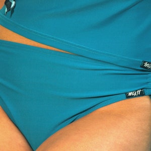 Bottom of pleated swimsuits on each side, women's swimsuit