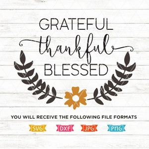 May include: A black and white graphic design with a wreath of leaves and a flower in the center. The text "Grateful thankful blessed" is written in a decorative font.