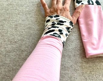 Leo polar bear arm warmers with leopard print and white fleece, reversible, wrist warmers