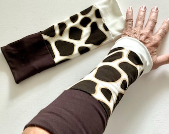 Brown and white animal print arm warmers, reversible, giraffe print jersey wrist warmers.