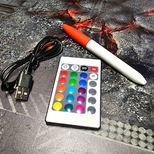Included accessories: Remote control, USB cord, Red dry-erase marker