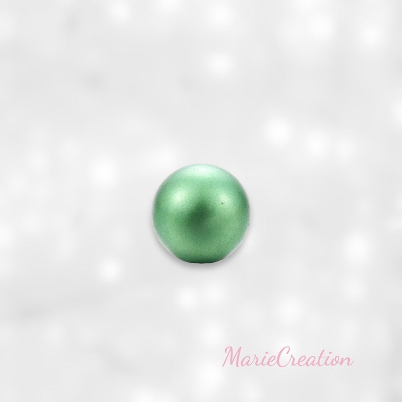 Metallic green musical sound bead for golden pregnancy Bola cage with a soft and light bell sound 16mm image 1