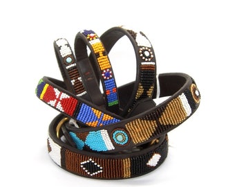 Beaded leather wrist bands from the Kenyan Maasai. Tracked delivery from UK.