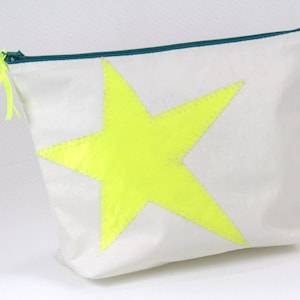 kleine Segeltuchkosmetiktasche mit neongelben Stern