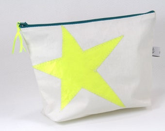 small canvas cosmetic bag with neon yellow star