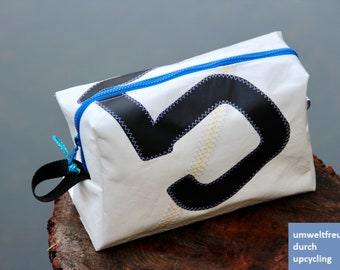 large toiletry bag is made of upcycled canvas