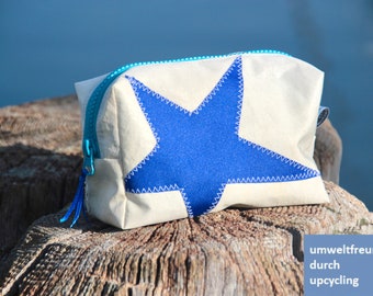 kleine Kosmetiktasche ist aus upcycling Segeltuch mit blauen Stern