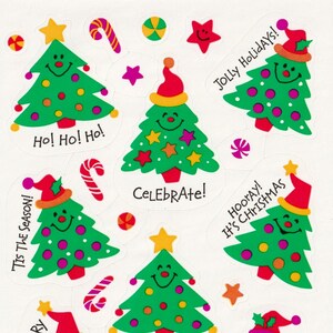 Feuille d'autocollants vintage des années 1980 et 1990 par Hallmark, arbres de Noël avec des visages souriants, phrases de célébration, vacances