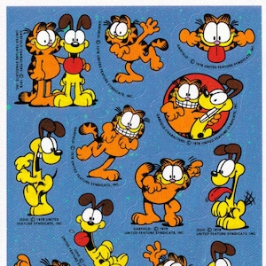 Feuille d'autocollants vintage des années 1980 des années 1980, Garfield le chat par Jim Davis et Hallmark, Odie avec la langue dehors et Garfield, éclaboussures de peinture bleue