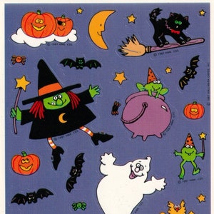 May include: A sheet of Halloween stickers with a variety of characters. Includes a witch, black cats, pumpkins, bats, ghosts, frogs, and an owl. The stickers are in bright colours on a blue background. The text "1987 HMK. CDS" is visible.