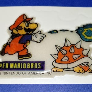 Jeu d'arcade vidéo Nintendo vintage des années 1980 - Sticker gonflé Super Mario Bros., Mario et tortue à crampons, dos original, rare