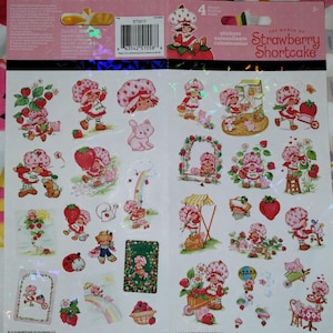 Planche d'autocollants Charlotte aux fraises de 2 pages, vêtements des années 80, poupée lion des sables
