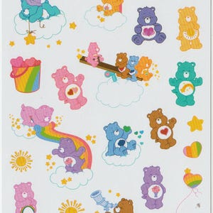 May include: A sheet of 25 Care Bears stickers featuring various Care Bears characters in different poses and settings. The stickers are on a white background with a rainbow and stars.