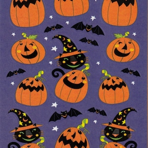 May include: A sheet of Halloween stickers featuring orange pumpkins with black jack-o'-lantern faces, black bats, and black cats wearing witch hats. The stickers are on a purple background with white stars.