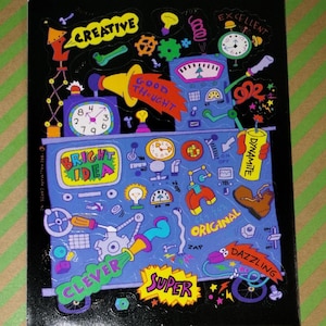 May include: A colorful sticker with a blue machine design, featuring the words "CREATIVE," "BRIGHT IDEA," "GOOD THOUGHT," "CLEVER," "SUPER," "ORIGINAL," and "DAZZLING." The design includes clocks, light bulbs, and other whimsical elements.
