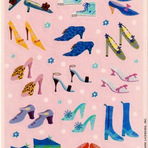 May include: A sheet of colorful stickers featuring various shoe designs. The stickers include sneakers, boots, heels, and sandals in a variety of colors and patterns.
