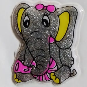 Sticker gonflé à paillettes scintillantes vintage des années 1980 sur le dos rogné d'origine, éléphant argenté avec trompette jouet et balle