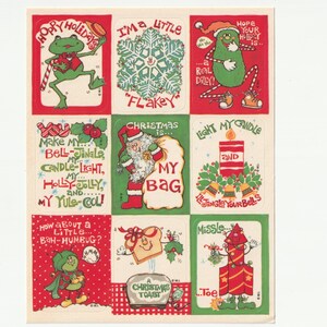 Feuille d'autocollants vintage des années 1980, humour de Noël par M.I. (Morgan, Inc.), Stickers grenouilles « Happy Holidays » par Paula