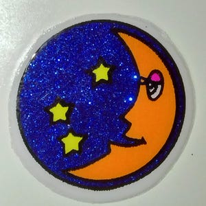 Sticker gonflé vintage des années 80, homme scintillant sur la lune, par Gordy - petite version sur support original