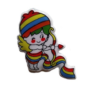 Sticker gonflé vintage des années 1980 - Petit garçon en tenue arc-en-ciel avec une flèche et un coeur au bout, Gordy ?  Adorable !