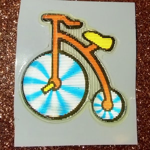 Sticker gonflé vintage des années 1980, 1990, vélo à l'ancienne avec roues qui tournent, scintillement/lenticulaire