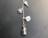 Summer fun keyring . Handmade Tibetan silver keyring, beach seaside themed with an ice cream, shells and a bucket and spade.