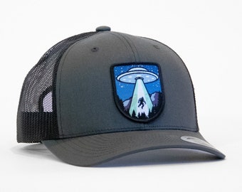 Bigfoot UFO Conspiracy Hat | Snap Back Retro Trucker Cap | Sasquatch Woven Patch on the front