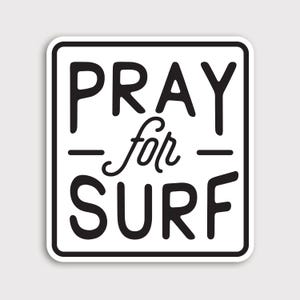 May include: A square sticker with rounded corners featuring a white background and a thick black border. The text PRAY FOR SURF is printed in black, with the word for written in a cursive script between the words PRAY and SURF in block letters.