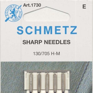 Puede incluir: Un paquete de 6 agujas de máquina de coser plateadas, etiquetadas "SCHMETZ MICROTEX SHARP NEEDLE 130/705 H-M 80/12".