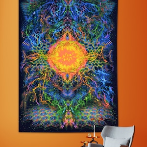 May include: A psychedelic tapestry with a bright yellow and orange sun-like center surrounded by blue, green, and purple flames. The tapestry has a black background with a geometric pattern at the bottom.