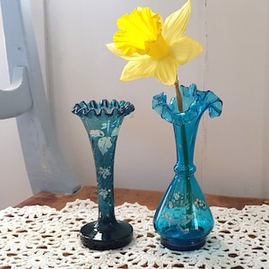 Two antique turquoise glass vases
