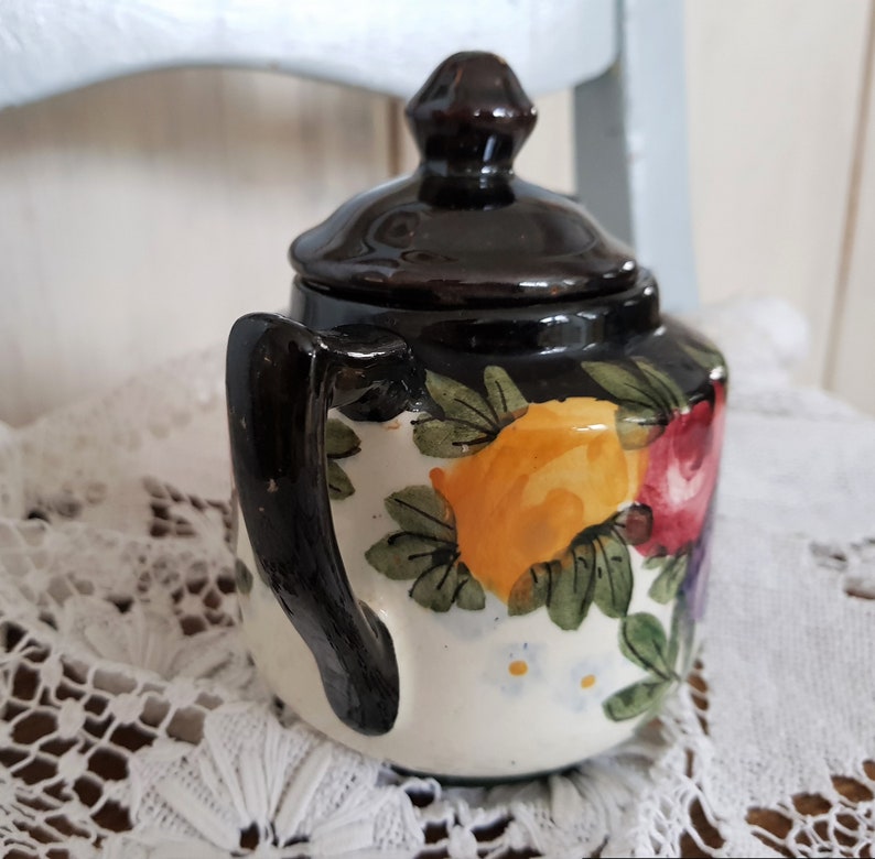 Very old hand-painted sugar tin