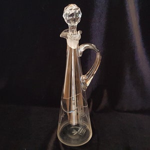 Old hand-cut glass carafe with stopper