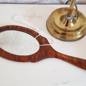Antieke houten handspiegel met bierglazuur