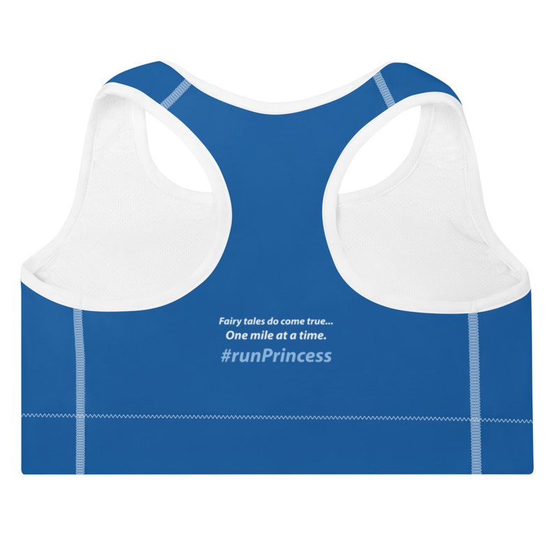 May include: Blue sports bra with white trim and the text "Fairy tales do come true... One mile at a time. #runPrincess" printed on the back.
