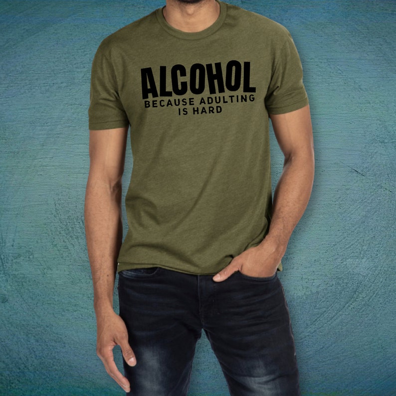 May include: A green t-shirt with the text "ALCOHOL BECAUSE ADULTING IS HARD" in black.