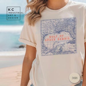 Golf von Weltraum-Träum-T-Shirt | Cosmic Mishap Vintage Karte | Anti-SpaceX Satire | Golfküsten-Crewneck, witziges politisches Geschenk