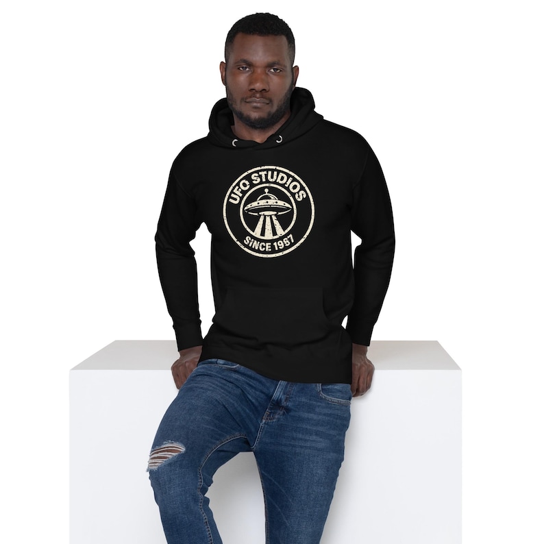 Official UFO Studios Premium Hoodie | Distressed Since 1987 Flying Saucer Seal | Black Pullover