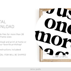 May include: A black and white printable art print with the text "Just one more" in a bold, sans-serif font. The print is framed in a light wood frame.