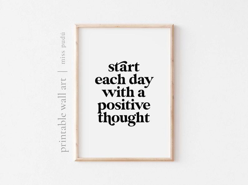 Puede incluir: Una impresi&oacute;n de arte de pared imprimible con un fondo blanco y texto negro que dice "start each day with a positive thought".