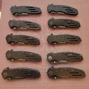 1 - Smith & Wesson Extreme Ops Knife Liner Lock Stainless Steel Handles And Blade 4 1/8&quot; Closed