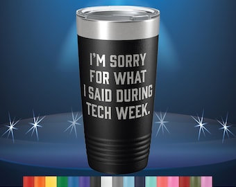 Op de afbeelding: Een zwarte roestvrijstalen tumbler met de tekst "Het spijt me voor wat ik tijdens de techweek heb gezegd."