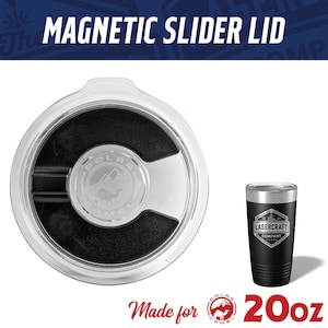 May include: A black and silver 20 ounce tumbler with a black slider lid. The tumbler has a laser-etched design that says "The Lasercraft Company". The lid is a magnetic slider lid.