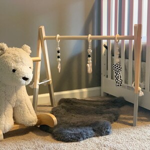 Wooden baby gym