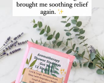 Puede incluir: Un paquete rectangular rosa etiquetado como Aromatherapy Shower Steamers Get Well 12 Single Use, que enumera beneficios como Cold & Cough, Immunity Boost, Sleep y Stuffy Head. El texto dice: Cold season hit and suddenly. I couldn't breathe or sleep through the night. This was the first thing that brought me soothing relief again. CARRIESABCS.
