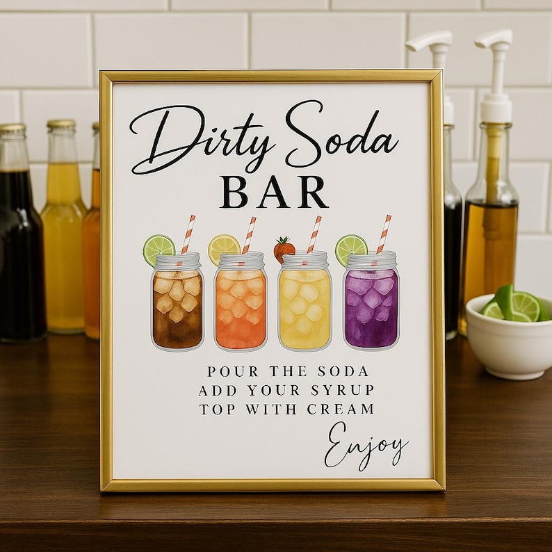 May include: A framed sign with the words "Dirty Soda Bar" in elegant script. The sign features illustrations of four mason jars filled with colorful sodas, each garnished with fruit and a striped straw. The sign also includes instructions and the word "Enjoy".