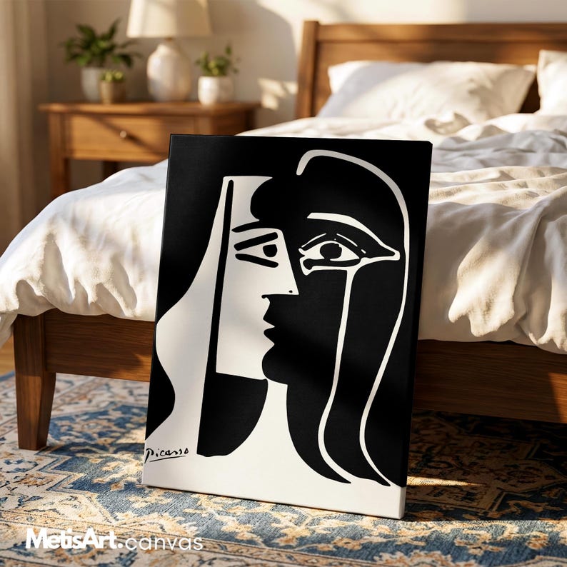 May include: A rectangular canvas print featuring a high-contrast black and white abstract portrait. The artwork displays a stylized face with bold lines and geometric shapes, including the signature Picasso in the bottom left corner of the print.